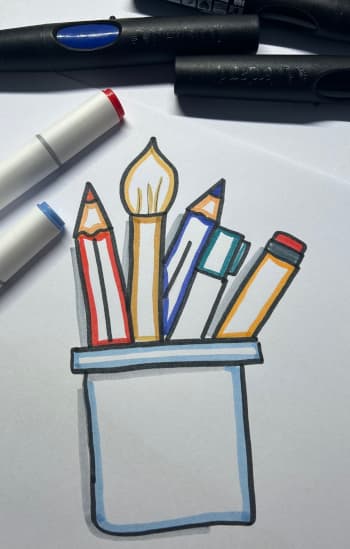 Skizze auf Papier mit Stiften in einem Becher